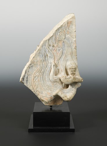 Lot 227 - A Chinese limestone stele fragment carved with apsaras, in Wei Dynasty style