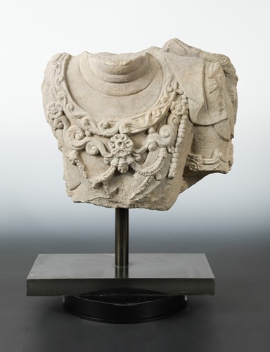 Lot 231 - A Chinese grey stone fragment figure of an Avalokiteshvara, in early Tang Dynasty style