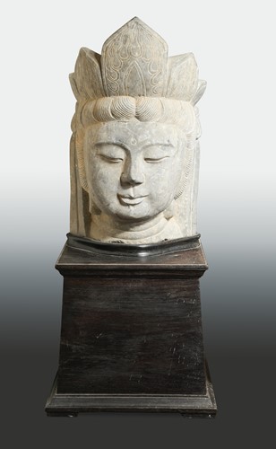 Lot 236 - A Chinese limestone head of Avalokiteshvara