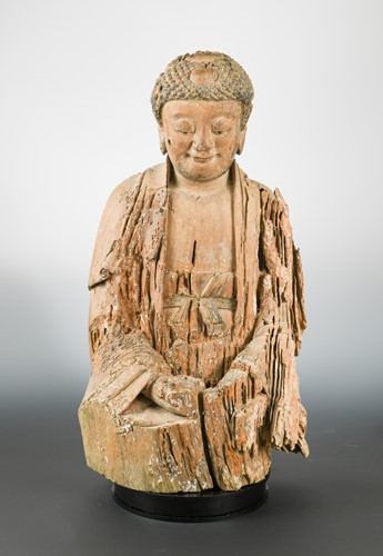 Lot 237 - A Chinese carved and polychrome wood seated figure of Sakyamuni Buddha, in Jin style