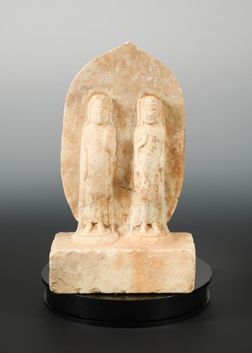 Lot 242 - A Chinese white marble double Bodhisattva stele, in Wei Dynasty style