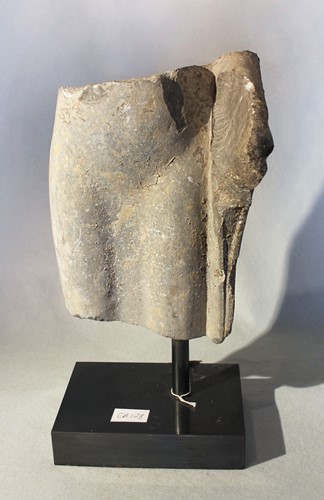 Lot 244 - A Chinese pale stone Buddhist triad stele with aureole, in Wei style