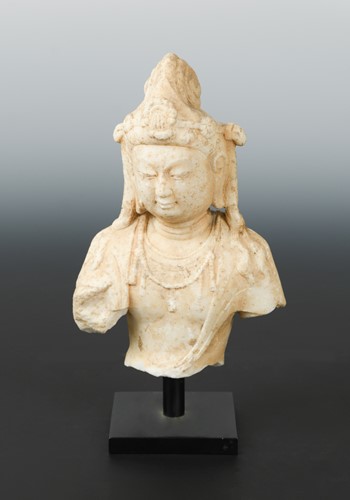 Lot 251 - A Chinese white marble head and shoulders of the Bodhisattva Guanyin, in Northern Qi style