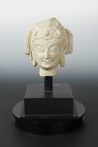 Lot 253 - A Chinese pale stone head fragment of a Bodhisattva, perhaps Sui Dynasty