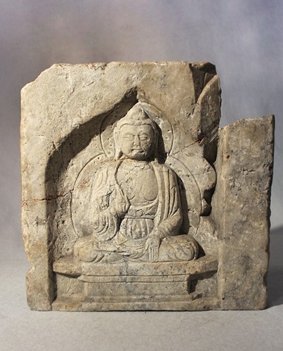 Lot 263 - A Chinese white stone architectural panel in relief with a meditating Buddha, in Tang Dynasty style