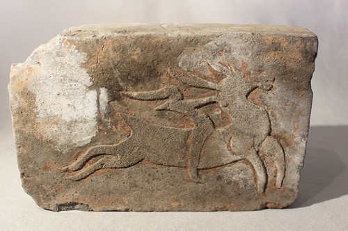 Lot 264 - A Chinese grey pottery rectangular brick, perhaps Han Dynasty (206BC-221 AD)