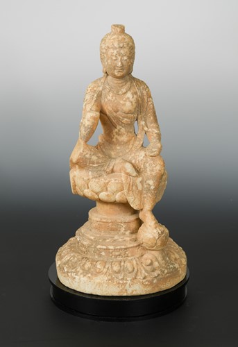 Lot 270 - A Chinese white marble Buddhist deity, in Northern Wei style, on a dais