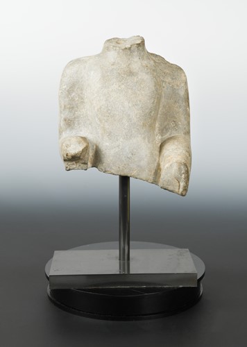 Lot 271 - A Chinese grey limestone upper body fragment of a standing Buddha, in Wei Dynasty style