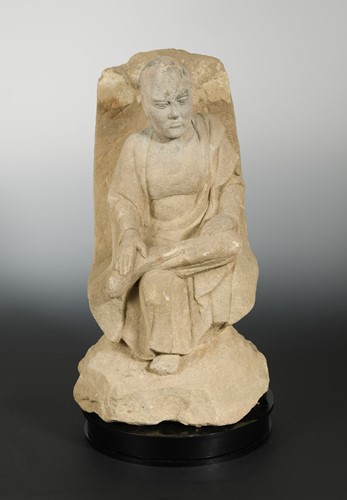 Lot 273 - A Chinese sandstone figure of a seated Monk