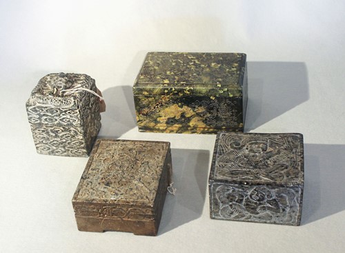 Lot 277 - A group of three Chinese decorative stone boxes and a relief carved block