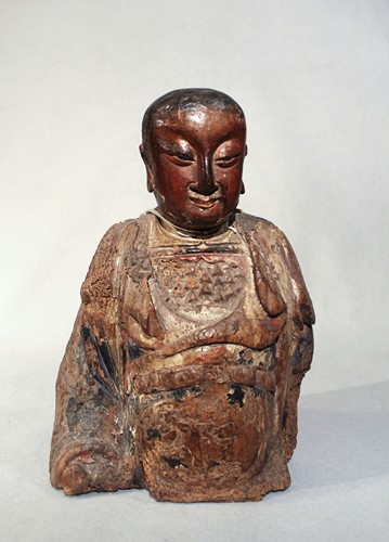 Lot 279 - A Chinese carved and painted wood bust of Wudi, God of War, probably late Ming Dynasty (1368-1644)