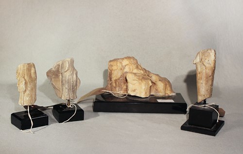 Lot 285 - Four Chinese white marble fragmentary Bodhisattva/Maitreya figures, all in Northern Wei / Qi style