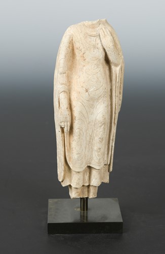 Lot 296 - A Chinese stucco figure of a standing Buddha in robes, in 6th/7th century style