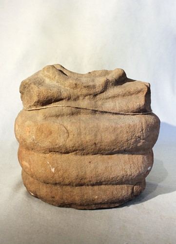 Lot 304 - A Chinese/Cambodia sandstone fragmentary figure of a seated Buddha, perhaps 10/11th century