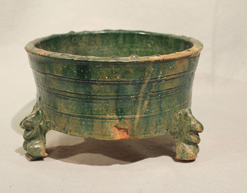 Lot 328 - A Chinese green glazed pottery tripod large censer, Han Dynasty