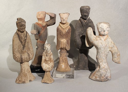 Lot 331 - A Group of six Chinese painted pottery standing figures of attendants and dancers, perhaps Han Dynasty