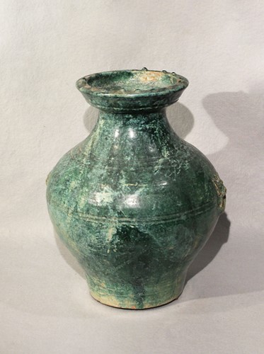 Lot 334 - A Chinese green glaze pottery Hu, Han Dynasty