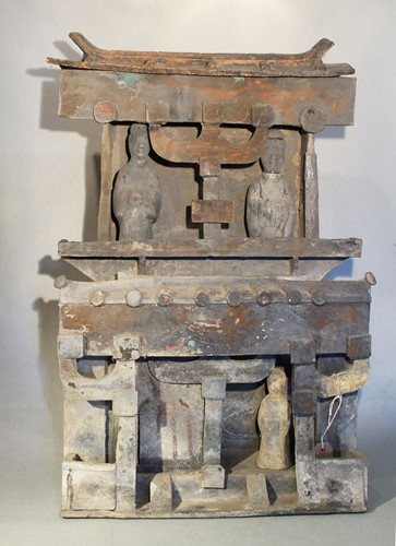 Lot 338 - A Chinese grey pottery, two storey building with two figures within, probably Han Dynasty