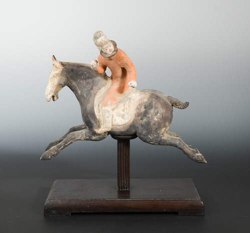 Lot 339 - A Chinese painted pottery polo equestrian group, in Tang Dynasty style