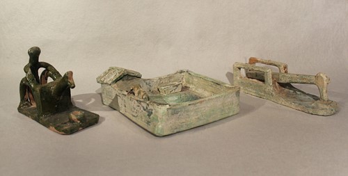Lot 341 - A group of three Chinese green glazed pottery items