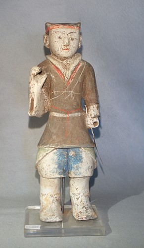 Lot 351 - A Chinese painted pottery, standing figure of a guard or attendant, perhaps Han Dynasty