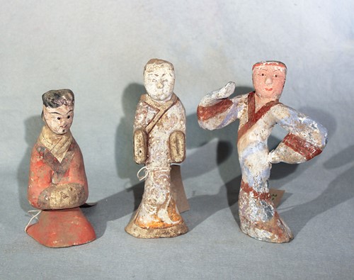 Lot 352 - A group of three Chinese painted pottery figures, perhaps Han Dynasty