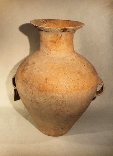 Lot 354 - A Chinese grey-ware pottery large two-handled jar, perhaps Caiyuan culture (2800-1900BC)
