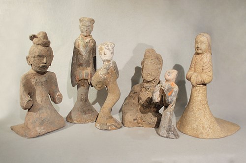 Lot 357 - A group of six Chinese painted grey pottery figures