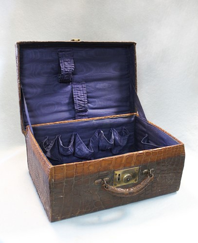 Lot 790 - An early 20th century crocodile leather dressing case