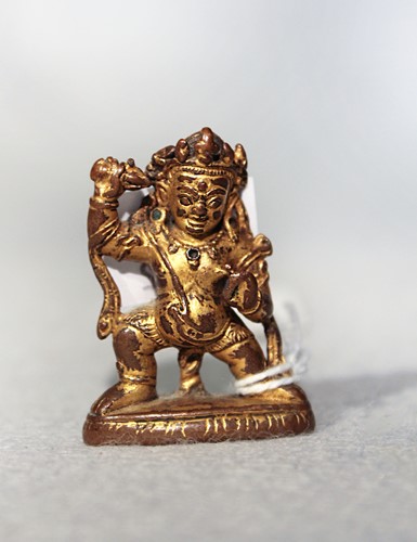 Lot 372 - A Tibetan gilt bronze small figure Vajrapani, probably 14th century
