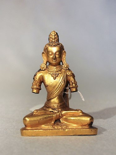 Lot 379 - A Tibetan gilt bronze seated Amitayus, 18th century