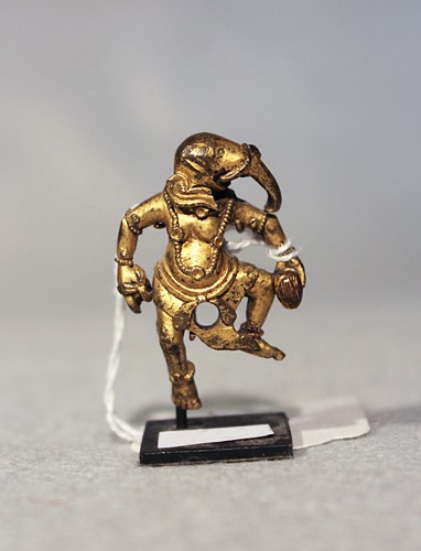 Lot 398 - A Tibetan gilt-bronze Ganesh fragment from a Mahakala statue, 19th century
