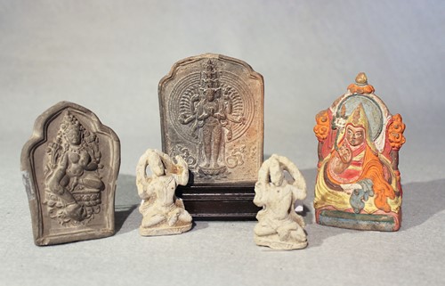 Lot 407 - An Indian/Nepalese Stucco multi-headed Avalokitesvara, 18th century or later