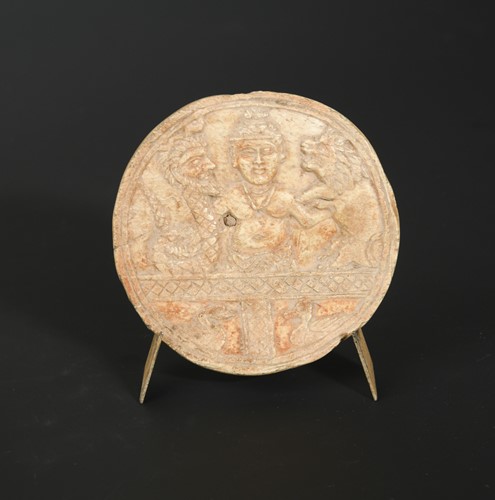 Lot 414 - A bone circular plaque, possibly Central Asia