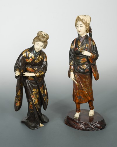 Lot 90 - Two Japanese carved wood, lacquered and ivory mounted figures of ladies, late Meiji period circa 1900