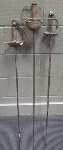 Lot 153 - Two basket hilted rapiers with pierced bowl...