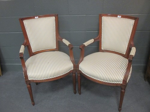 Lot 561 - A pair of Louis XVI style fauteuils (2)