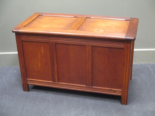 Lot 576 - A "Heals" of London oak chest with ivorine...