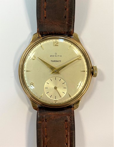 Lot 253 - Zenith - A gentleman's 9ct gold wristwatch retailed by Tarratt