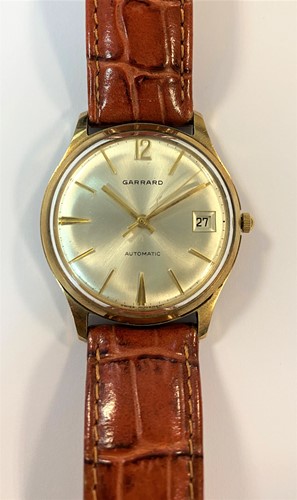 Lot 239 - Garrard - A gentleman's 9ct gold wristwatch