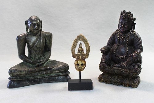 Lot 95 - A Sri Lankan bronze of a seated Buddha, Kandy Period, 18th century