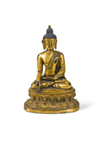 Lot 93 - A Nepalese gilt bronze seated Buddha, 18th/19th century