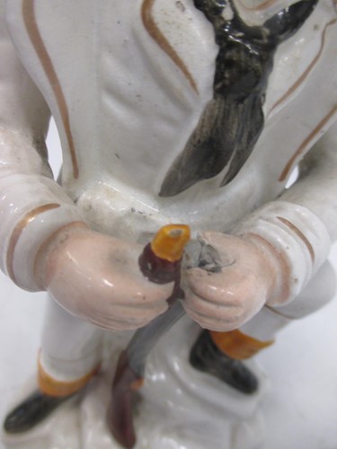 Lot 10 - Pair of Staffordshire figures of huntsmen (one...