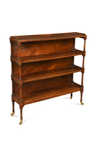 Lot 314 - A George IV mahogany and boxwood strung four tier open bookshelf