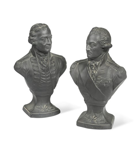 Lot 299 - A rare pair of Hercalaneum pottery black basalt portrait busts, circa 1800