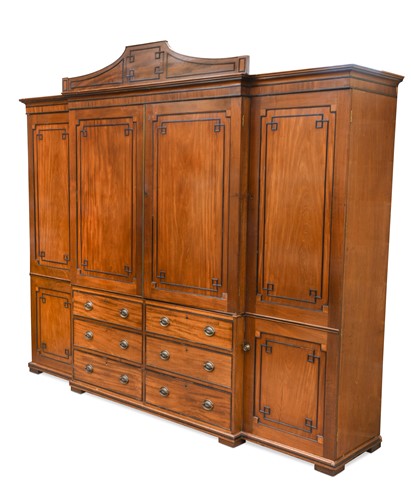 Lot 298 - A Regency mahogany and ebony strung breakfront wardrobe, circa 1820