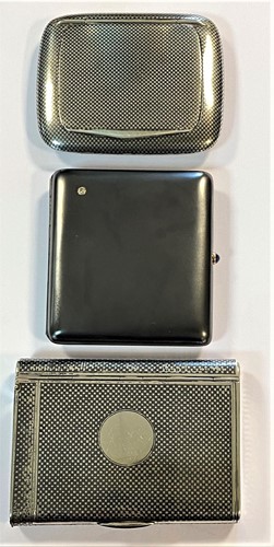 Lot 270 - A trio of continental metalwares pocket cigarette / tobacco cases