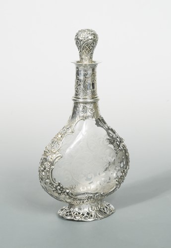 Lot 321 - A continental metalwares silver overlay and decorated glass liqueur decanter