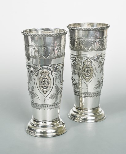 Lot 306 - A near pair of silver plated 'Cruft's Novice Special' trophy vases