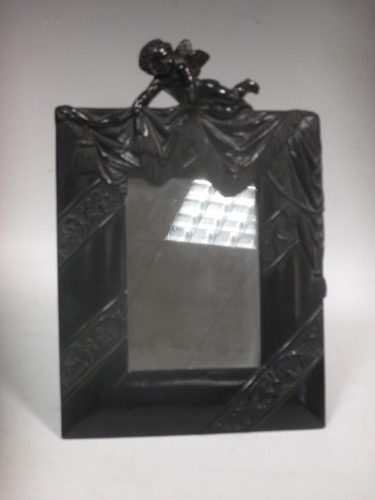 Lot 10 - An early 20th century moulded composition...